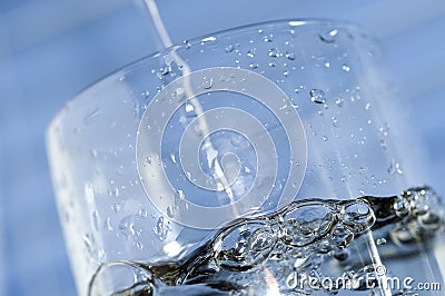 Fresh water and a glass Stock Photo