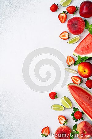 Fresh watermelon, peach, strawberry, nectarine, mint, lime on grey background. Juicy summer dessert. Selection of Stock Photo