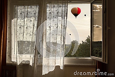 Fresh wind in the window. View from the window to the balloons Stock Photo