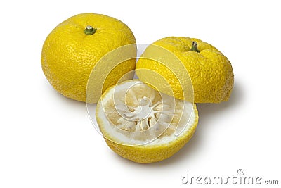 Fresh yellow whole and half Japanese Yuzu Stock Photo
