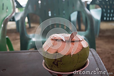 fresh young coconut that has been peeled and ready to serve. Young coconut water has many benefits to replace body ions Stock Photo