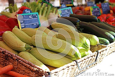 Fresh zucchinis at a farmer market in France, Europe. Italian vegetables. Street French market at Nice. Stock Photo