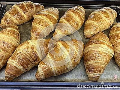 Freshly baked croissants on tray food Stock Photo