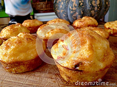 Freshly baked delicious home cooked country style cheese egg bacon muffins Stock Photo