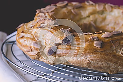 Freshly baked french dessert profiterole cake covered with roast Stock Photo
