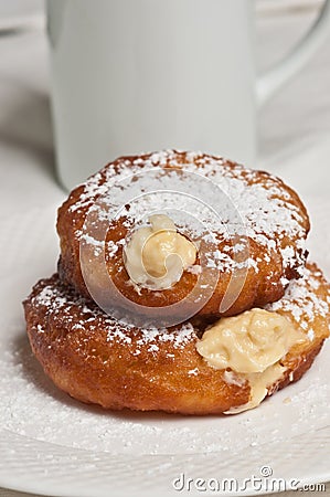 freshly baked, homemade,bavarian cream filled donuts Stock Photo