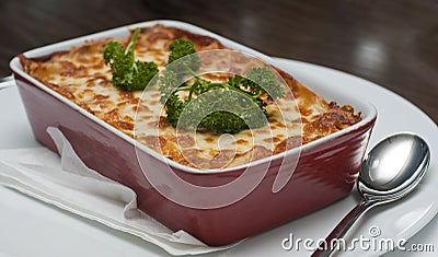 Fresh lasagna dish serving with garnish Stock Photo