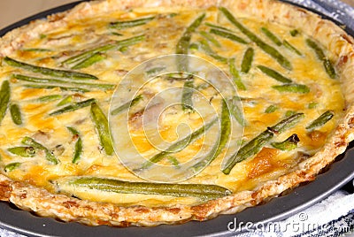 Freshly baked quiche with green beans and chicken Stock Photo