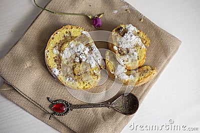 freshly baked two piece roll with apples on a napkin horizontal Stock Photo