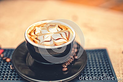 Freshly brewed coffee on the counter at local pub, mixed with milk Stock Photo