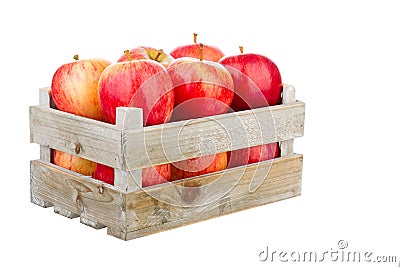 Freshly harvested apples in a wooden crate Stock Photo