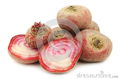 Freshly harvested red chioggia beet root and two halves Stock Photo