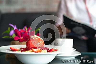 Freshly homemade Pancakes Strawberry Crumble on white dessert plate Stock Photo