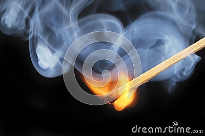 Freshly ignited match Stock Photo