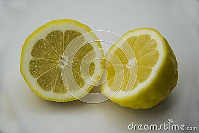 Freshly lemons cut in half Stock Photo