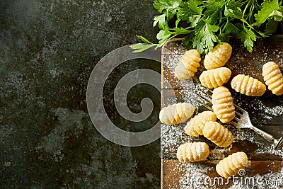 Freshly made gnocchi dumplings with parsley Stock Photo