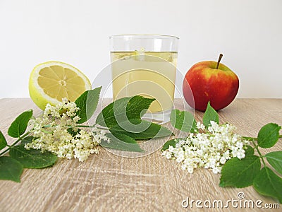 Lemonade with elder flowers, apple juice and lemon Stock Photo