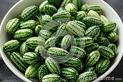 Freshly picked Cucamelon in white bowl. vegetable healthy food Stock Photo