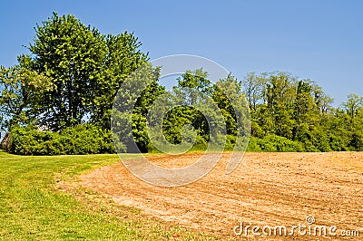 Freshly plowed field Stock Photo