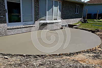 Freshly poured concrete outside patio Stock Photo