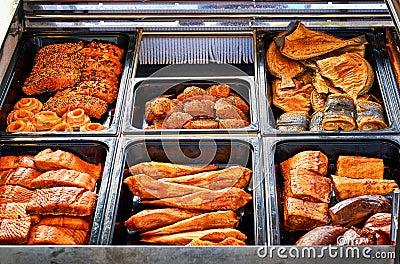 Freshly prepared smoked fish in a sales stand Stock Photo