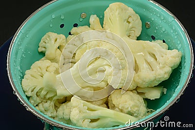 Freshly rinsed cauliflower pieces Stock Photo