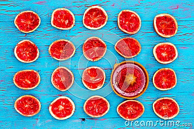 Freshly squeezed ruby grapefruit halves Stock Photo