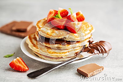 Freshmade pancakes served with strawberry and choco paste Stock Photo
