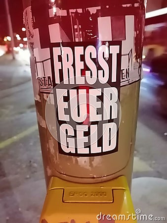 `fresst euer Geld` Sticker - `eat your money` Sticker Editorial Stock Photo