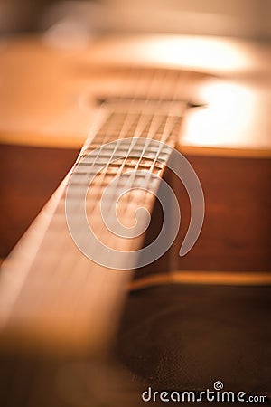 Fretboard close up on acoustic guitar Stock Photo