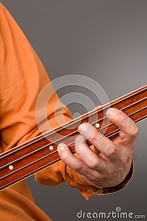 Fretless bass players left hand Stock Photo