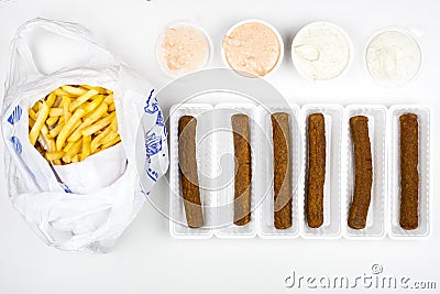Fricandel with french fries and sauces Stock Photo