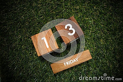 Friday 13th on wooden calendar. bad luck, Misfortune Day. Stock Photo