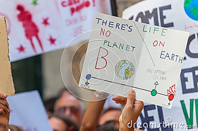 Fridays for future: students hands showing banners and boards: there is no planet B Editorial Stock Photo