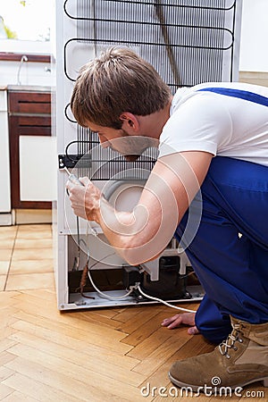 Fridge repair at home Stock Photo