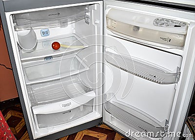 An empty fridge, as many are found in different homes due to the coronavirus pandemic. Stock Photo