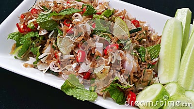 Frie fish spicy salad with herbs Stock Photo