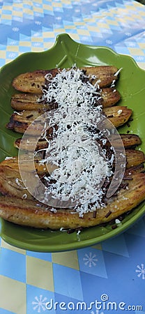 fried banana with chocolated and cheese topping Stock Photo