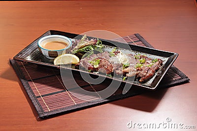 Fried beef cuisine in sauce Stock Photo