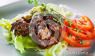 Fried beef piece fillet with vegetables salad Stock Photo