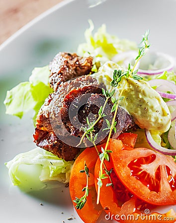 Fried beef piece fillet with vegetables salad Stock Photo