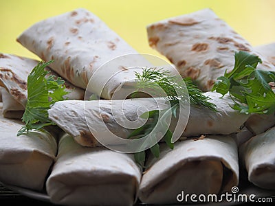 Pies of lavash with filling together close-up. Stock Photo
