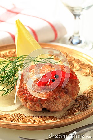 Fried burger and endive leaves Stock Photo