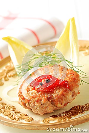 Fried burger and endive leaves Stock Photo