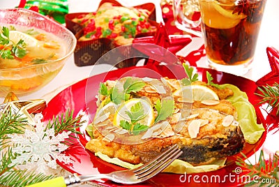Fried carp with almonds for christmas Stock Photo