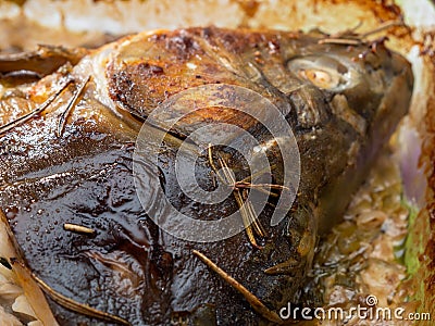 Fried carp with spices. Freshly fried fish. Stock Photo