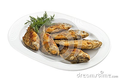 Fried carp on a white plate Stock Photo