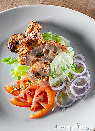 Fried chicken breast piece fillet with vegetables salad Stock Photo