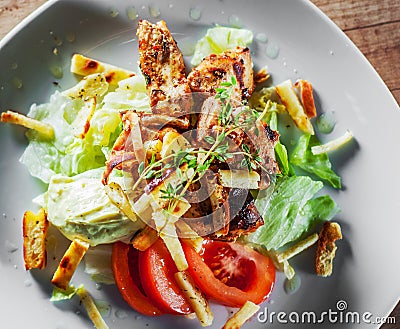 Fried chicken breast piece fillet with vegetables salad Stock Photo