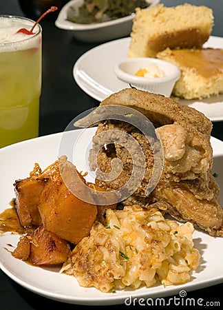 Fried chicken with candied yams Stock Photo